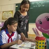 Cô Trần Thị Liễn, giáo viên Trường Tiểu học Trần Khánh Dư, phường An Hòa, thành phố Rạch Giá được trợ giúp từ Chương trình “Tiếp sức người Thầy.” (Ảnh: Hồng Đạt/TTXVN)