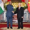 Tổng Bí thư, Chủ tịch nước Nguyễn Phú Trọng chụp ảnh chung với Tổng thống Ấn Độ Ram Nath Kovind. (Ảnh: Trí Dũng/TTXVN)