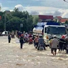 Ngập lụt trên tuyến Quốc lộ 1A, đoạn qua khu vực xã Phan Rí Thành, huyện Bắc Bình, Bình Thuận. (Nguồn: baobinhthuan.com.vn)