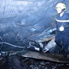 Hình ảnh hiện trường vụ cháy lớn thiêu rụi gara ôtô ở Nam Trung Yên 