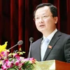 Ông Cao Tường Huy phát biểu tại kỳ họp Hội đồng Nhân dân tỉnh Quảng Ninh. (Ảnh: Văn Đức/TTXVN)