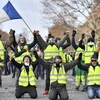 Người biểu tình "Áo vàng" phản đối chi phí sinh hoạt đắt đỏ tại Paris, Pháp ngày 8/12/2018. (Nguồn: THX/TTXVN)
