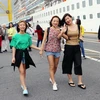 Khách du lịch háo hức đến Đà Nẵng bằng đường biển trong ngày đầu năm 2019. (Ảnh: Trần Lê Lâm/TTXVN)