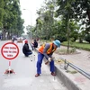 Hình ảnh Hà Nội lắp rào chắn, chuẩn bị xén hè mở rộng đường