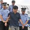 Một quan chức tham nhũng bị dẫn độ từ nước ngoài về Trung Quốc. (Nguồn: china.org.cn)