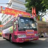 "Chuyến xe yêu thương" đưa bệnh nhân ung thư rời Bệnh viện Ung bướu Thành phố Hồ Chí Minh về quê đón Tết. (Ảnh: Đinh Hằng/TTXVN)