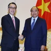 Thủ tướng Nguyễn Xuân Phúc tiếp ông Kanetsugu Mike, Tổng giám đốc Ngân hàng MUFG, Nhật Bản. (Ảnh: Thống Nhất/TTXVN)