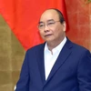Thủ tướng Nguyễn Xuân Phúc phát biểu khai mạc phiên họp Chính phủ thường kỳ tháng 2. (Ảnh: Thống Nhất/TTXVN)