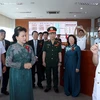 Chủ tịch Quốc hội Nguyễn Thị Kim Ngân tham quan Phòng chỉ huy điều hành của Tổng Công ty Tân cảng Sài Gòn. (Ảnh: Trọng Đức/TTXVN)