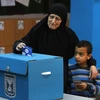 Cử tri Israel bỏ phiếu tại điểm bầu cử ở thị trấn Taiyiba ngày 9/4/2019. (Nguồn: AFP/TTXVN)