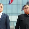 Tổng thống Hàn Quốc Moon Jea-in và nhà lãnh đạo Triều Tiên Kim Jong-un. (Nguồn: Getty Images)