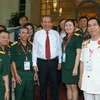 Phó Thủ tướng Thường trực Chính phủ Trương Hòa Bình với các đại biểu. (Ảnh: Doãn Tấn/TTXVN)