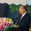 Thủ tướng Nguyễn Xuân Phúc phát biểu tại Lễ kỷ niệm 990 năm Thanh Hóa. (Ảnh: Thống Nhất/TTXVN)