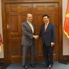 Phó Thủ tướng, Bộ trưởng Ngoại giao Phạm Bình Minh gặp Bộ trưởng Thương mại Wilbur Ross tại trụ sở Bộ Thương mại Hoa Kỳ ở Washington D.C. (Ảnh: Đặng Huyền/TTXVN)