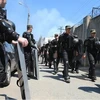 Hàng trăm lính Vệ binh quốc gia và cảnh sát Ukraine đã được triển khai tới nhà tù để dập tắt bạo loạn. (Nguồn: AFP)
