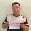 Đối tượng Cao Mạnh Quỳnh tại cơ quan công an. (Ảnh: Nguyễn Văn Việt/TTXVN)