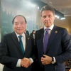 Thủ tướng Nguyễn Xuân Phúc gặp Thủ tướng Italy Giuseppe Conte Hội nghị Thượng đỉnh Nhóm các nước công nghiệp phát triển hàng đầu thế giới (G7) mở rộng, Canada, tháng 6/2018. (Nguồn: TTXVN)
