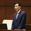 Bộ trưởng Bộ Văn hóa, Thể thao và Du lịch Nguyễn Ngọc Thiện trả lời chất vấn của đại biểu Quốc hội. (Ảnh: Văn Điệp/TTXVN)