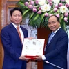 Thủ tướng Nguyễn Xuân Phúc tiếp ông Chey Tae-won, Chủ tịch Tập đoàn SK của Hàn Quốc. (Ảnh: Thống Nhất/TTXVN)