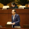 Bộ trưởng Bộ Lao động-Thương binh và Xã hội Đào Ngọc Dung giải trình làm rõ ý kiến của Đại biểu Quốc hội. (Ảnh: Phương Hoa/TTXVN)