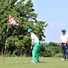 Các tay golf tranh tài tại giải. (Ảnh: Dương Trí/Vietnam+)