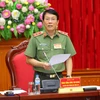 Trung tướng Lương Tam Quang, Chánh văn phòng Bộ Công an phát biểu. (Ảnh: Doãn Tấn/TTXVN)
