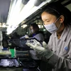Một nhà máy sản xuất máy tính xách tay ở Trung Quốc. (Nguồn: AFP)