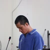 Bị cáo Huỳnh Thanh Tú (45 tuổi, ngụ tại thành phố Hồ Chí Minh) tại phiên tòa. (Ảnh: Huyền Trang/TTXVN)