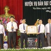Lễ trao Bằng công nhận huyện đạt chuẩn nông thôn mới của Chính phủ cho Ủy ban Nhân dân huyện Vụ Bản, tỉnh Nam Định. (Ảnh: Công Luật/TTXVN)