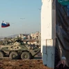 Xe bọc thép Nga hỗ trợ quân đội chính phủ Syria trong một chiến dịch quân sự. (Nguồn: news.sky.com)