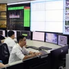 Hoạt động tại Trung tâm Giám sát và điều khiển giao thông Thành phố Hồ Chí Minh. (Nguồn: TTXVN)