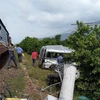 Hiện trường vụ tàu hỏa tông ôtô, 4 người thương vong tại Bình Thuận. (Ảnh: Nguyễn Thanh/TTXVN)