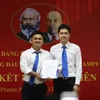 Trao quyết đinh kết nạp cho tân đảng viên tại chi bộ BIDC. (Ảnh: PV/Vietnam+)