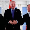 Lãnh đạo Nga, Iran và Thổ Nhĩ Kỳ tại hội nghị thượng đỉnh các nước bảo trợ lệnh ngừng bắn ở Syria diễn ra ngày 16/9 tại thủ đô Ankara, Thổ Nhĩ Kỳ. (Nguồn: AFP)