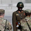 Binh sỹ Mỹ và Triều Tiên tại khu phi quân sự hai miền Triều Tiên. (Nguồn: Getty Images)