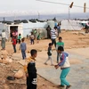 Người di cư Syria tại một trại tị nạn ở thung lũng Bekaa, Liban. (Nguồn: AFP/TTXVN)