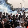 Người biểu tình bạo động tại Baghdad, Iraq, ngày 1/10/2019. (Nguồn: AFP/TTXVN)