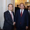 Thủ tướng Nguyễn Xuân Phúc tiếp Chủ tịch Hội hữu nghị Hàn -Việt Choi Young Joo đến chào xã giao. (Ảnh: Thống Nhất/TTXVN)