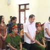 Các bị cáo trong vụ án gian lận điểm thi trung học phổ thông Quốc gia năm 2018 tại Hà Giang trước giờ tuyên án. (Nguồn: TTXVN)