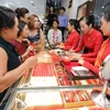 Khách mua bán vàng tại Công ty kinh doanh vàng bạc Mạnh Hải, Hà Nội. Ảnh tư liệu. (Ảnh: Trần Việt/TTXVN)