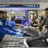 Kiểm tra an ninh hàng không tại một sân bay của Mỹ. (Nguồn: AFP)