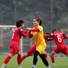 Đội tuyển nữ Việt Nam tập luyện trong cuộc đua giành vé dự Olympic Tokyo 2020. (Nguồn: VFF)