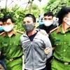 Đối tượng Đinh Trường Sơn bị lực lượng Công an huyện Tuyên Hóa, Quảng Bình bắt giữ. (Nguồn: TTXVN phát)