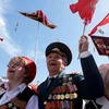 Cựu chiến binh, người dân Nga vui mừng trong ngày lễ kỷ niệm Ngày Chiến thắng trong Chiến tranh Vệ quốc vĩ đại. (Nguồn: Moskva News Agency)