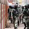 Cảnh sát chống bạo động được triển khai tại quận Wanchai. (Nguồn: scmp)