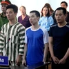 Các bị cáo tại phiên tòa (từ phải qua): Nguyễn Văn Nưng, Nguyễn Viết Huy, Nguyễn Minh Hoàng. (Ảnh: Nguyễn Thanh/TTXVN)