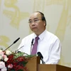 Thủ tướng Chính phủ Nguyễn Xuân Phúc chủ trì Hội nghị trực tuyến Chính phủ với các địa phương ngày 4/7. (Ảnh: TTXVN)