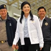 Thủ tướng Thái Lan Yingluck Shinawatra (giữa). (Nguồn: AFP-TTXVN)