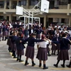 [Photo] Peru cho học sinh diễn tập đối phó với động đất