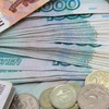 Thị trường Nga bất ổn do tỷ giá hối đoái giữa Ruble và USD tăng